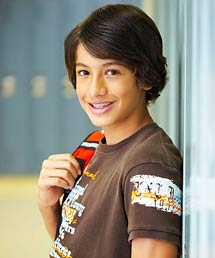 photo of a smiling teenage boy wearing braces